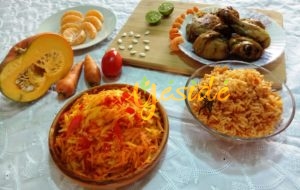 Carrot, Pumpkin Tomato Salad with Jollof rice and chicken with Tangerine