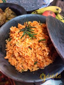 Jollof rice made from brown rice in a local clay pot for National Day Lunch in NIgeria