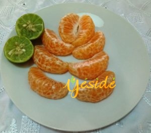 Tangerine fruit removed from the peel with lime